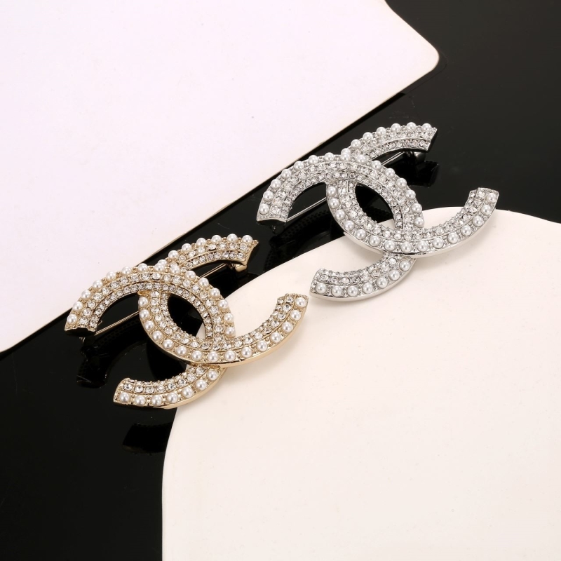 Ch**el brooches